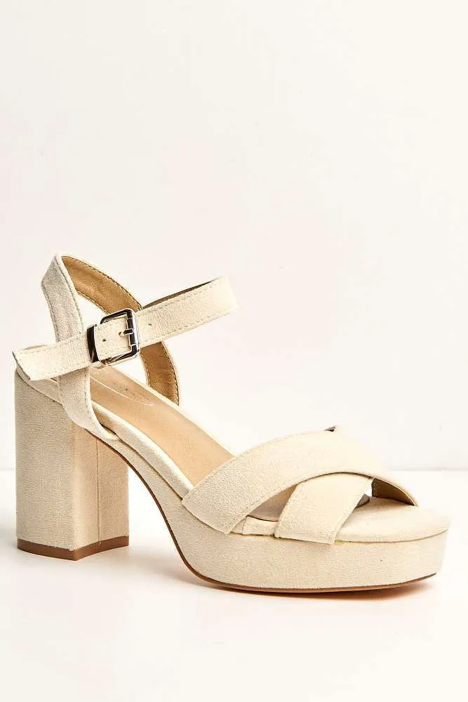 Dove Criss Cross Block Heel Ankle Strap Sandals in Cream